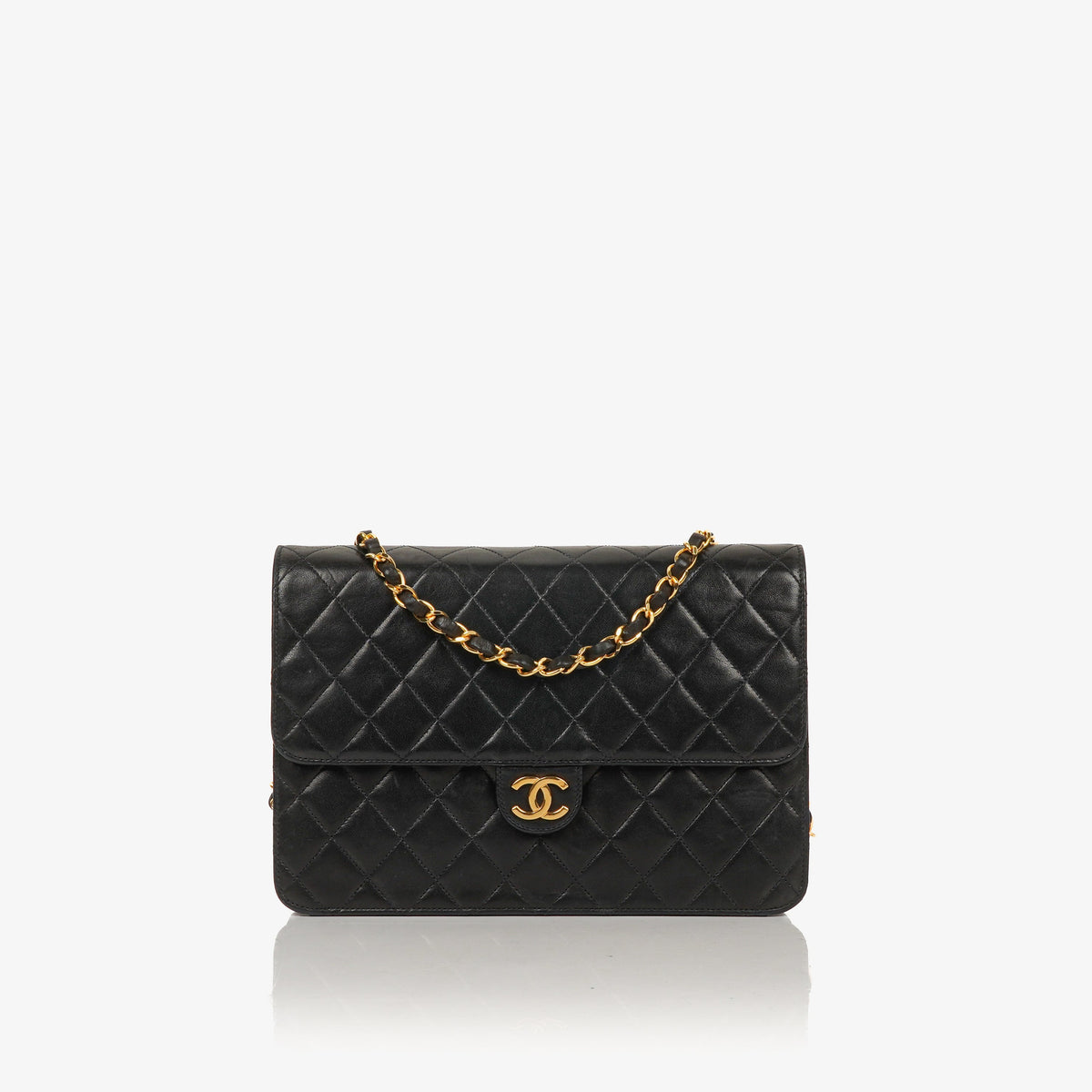 Vintage Chanel Classic Single Flap bag in black quilted lambskin with 24k gold-plated hardware