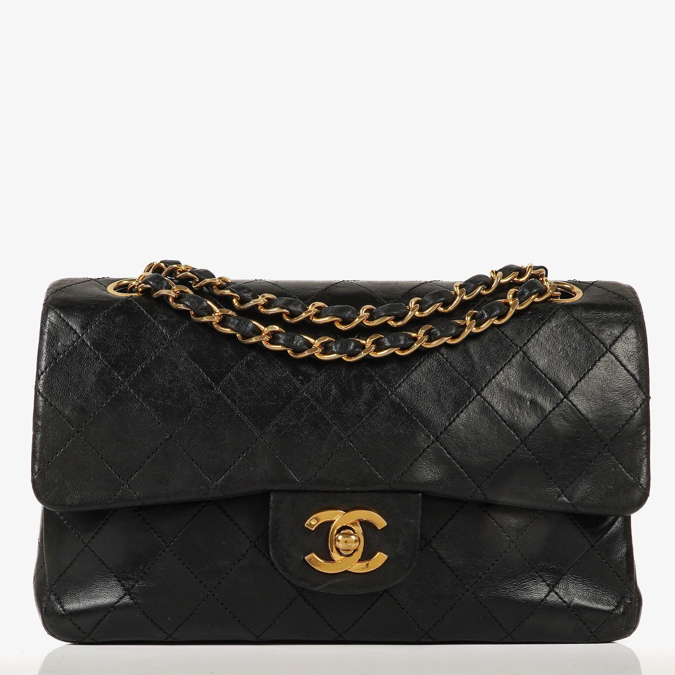 Vintage Chanel Small Classic Double Flap bag in black quilted lambskin