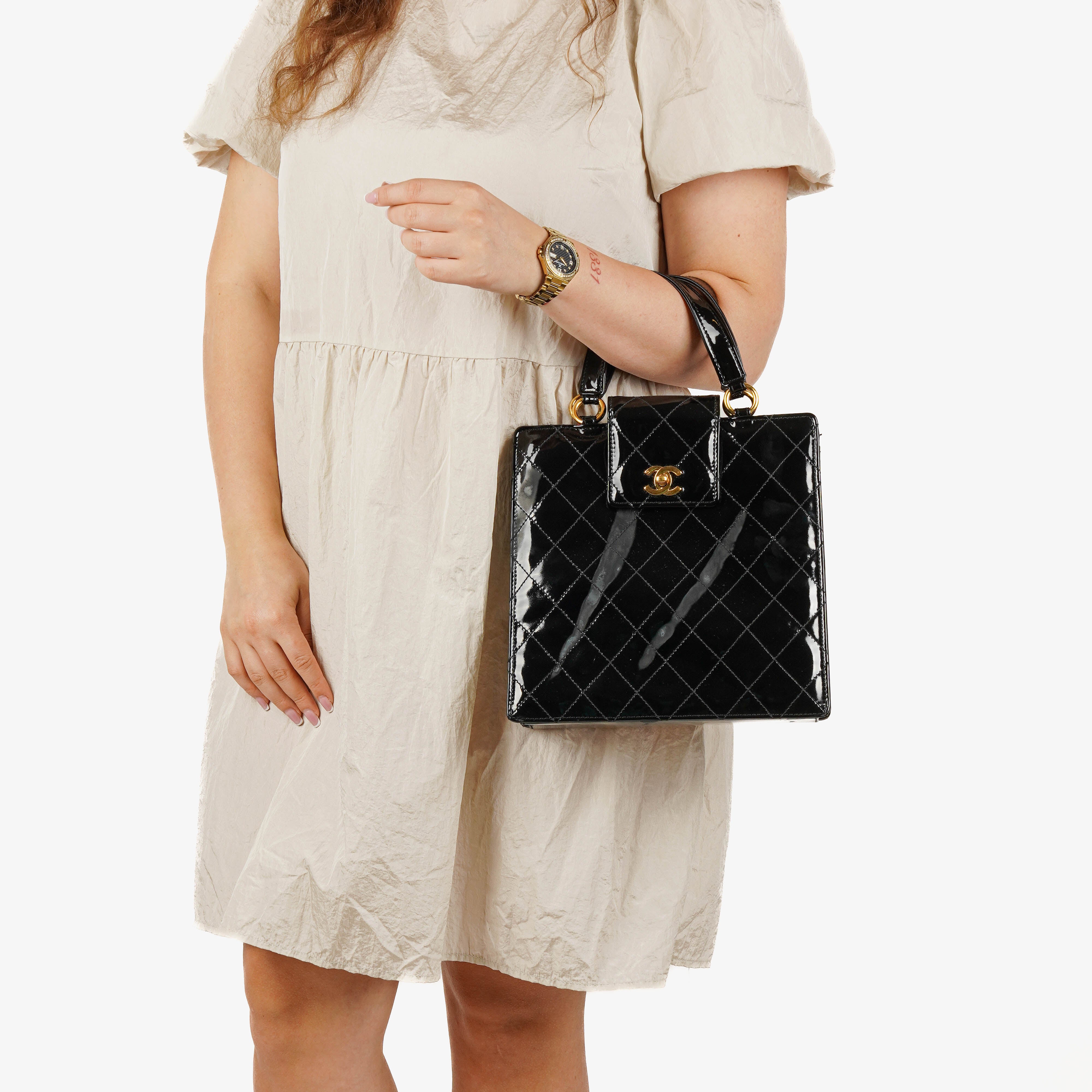 Chanel CC Black Quilted Patent Leather Handbag With 24K Gold-Plated Hardware