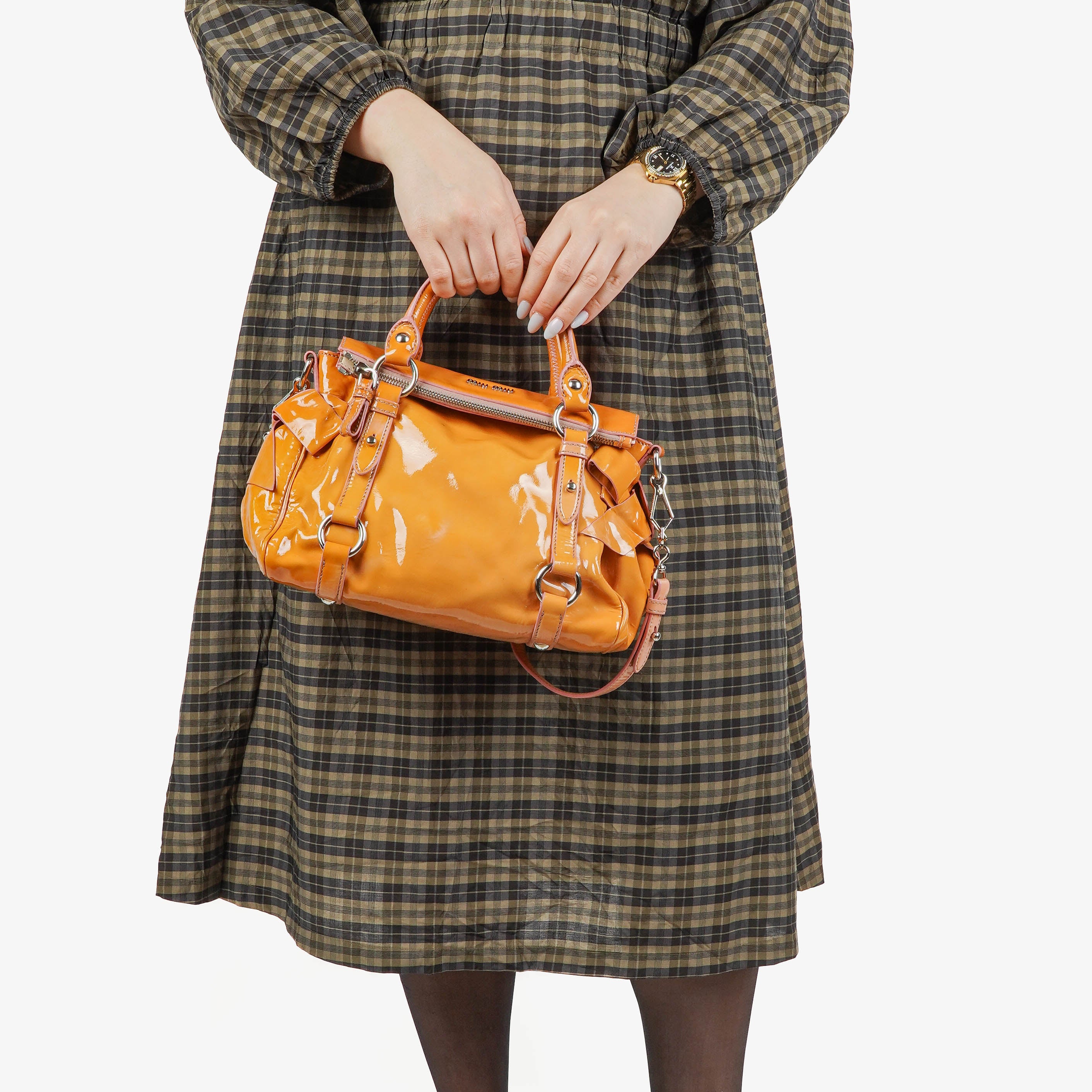 Sac cartable en cuir verni avec nœud Miu Miu