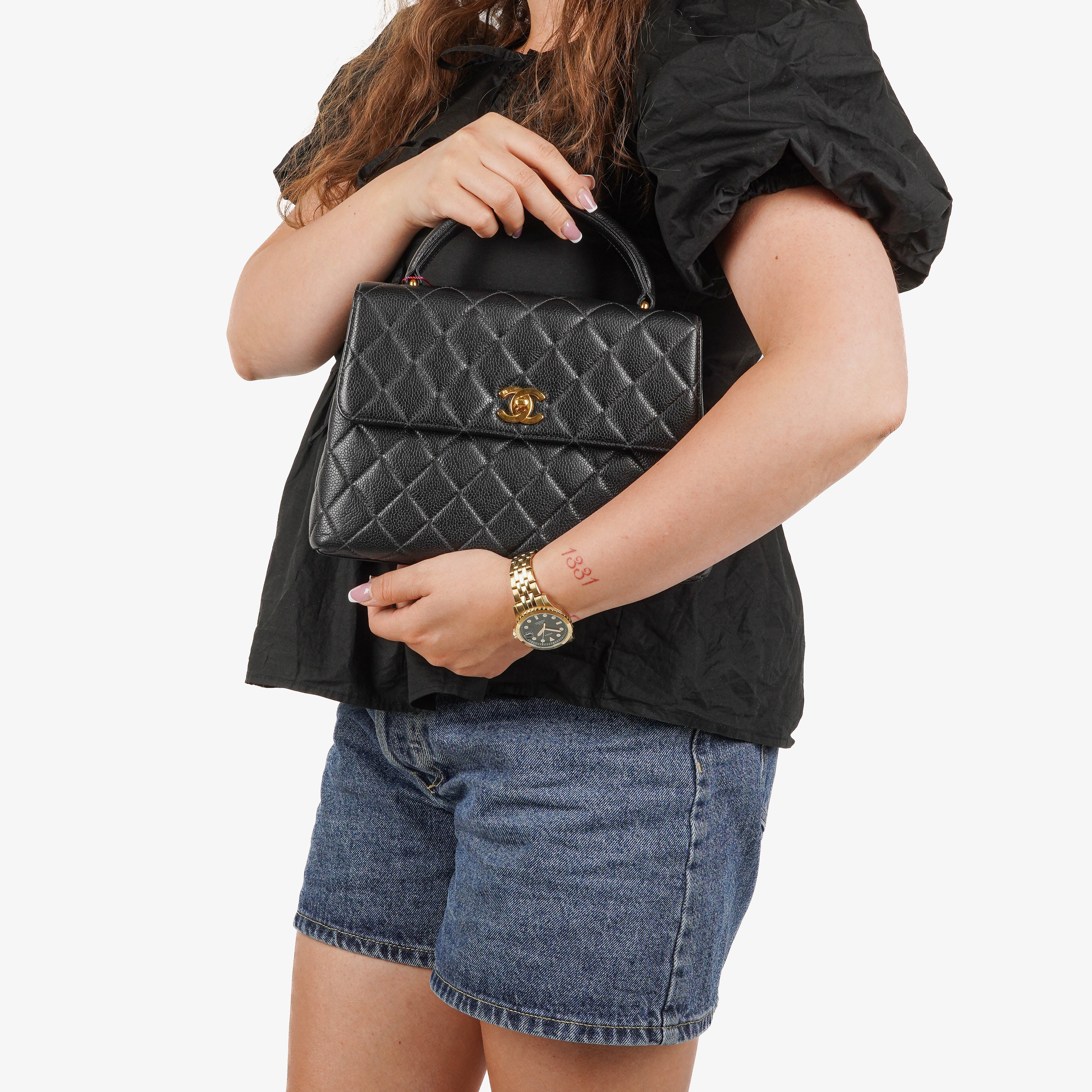Chanel Kelly Top Handle Caviar Black Quilted Leather Bag