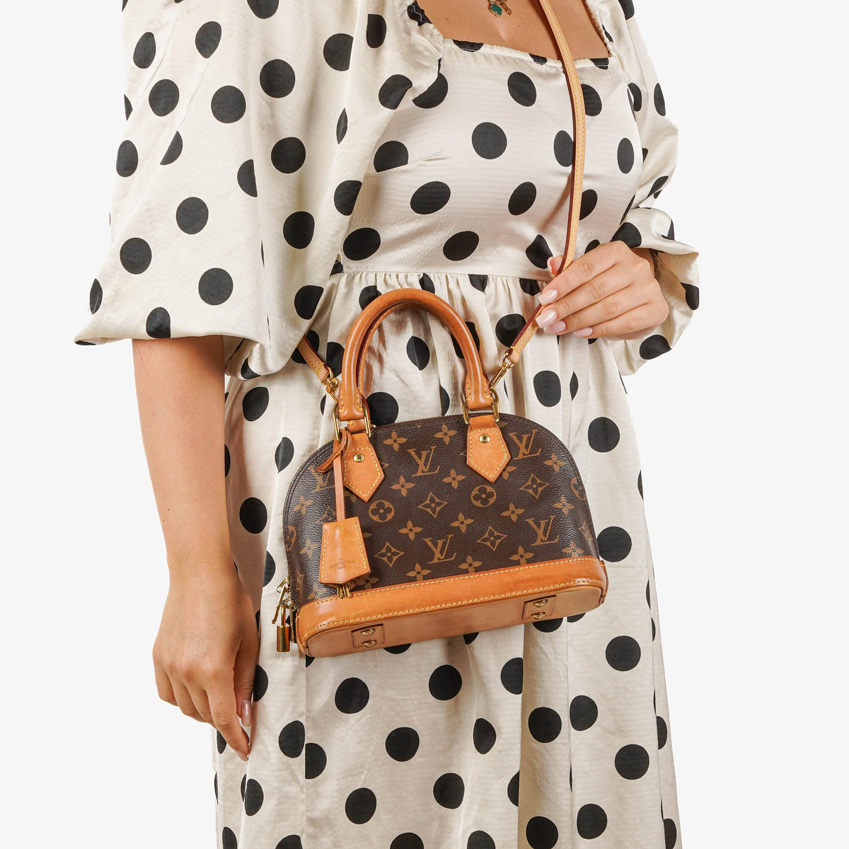 Louis Vuitton Alma BB Monogram Canvas Handbag