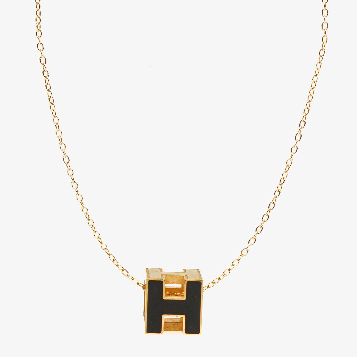 Hermès Gold Plated and Black Enamel Cage D'H Pendant Necklace