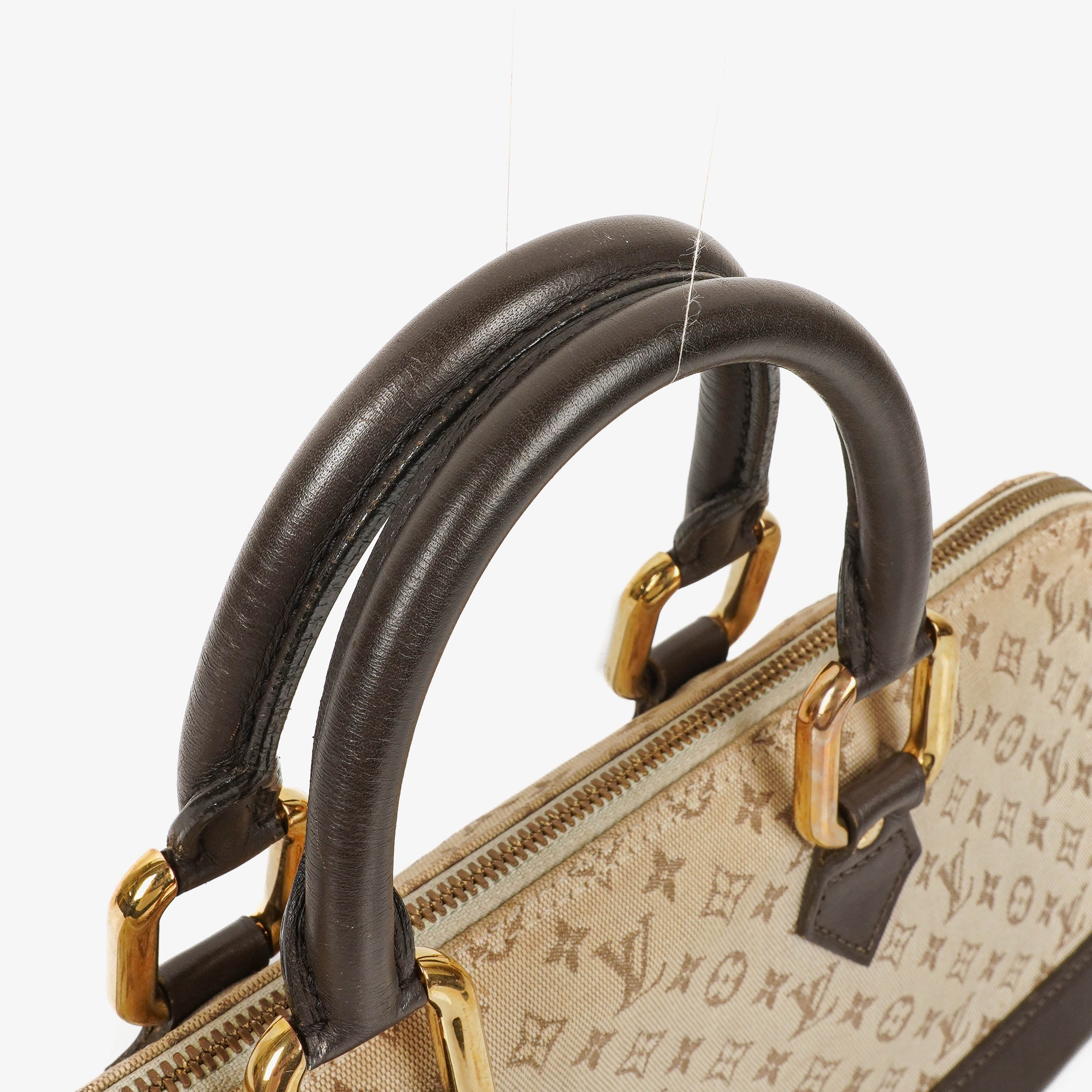 Louis Vuitton Alma Long Brown Monogram Mini Lin Handbag