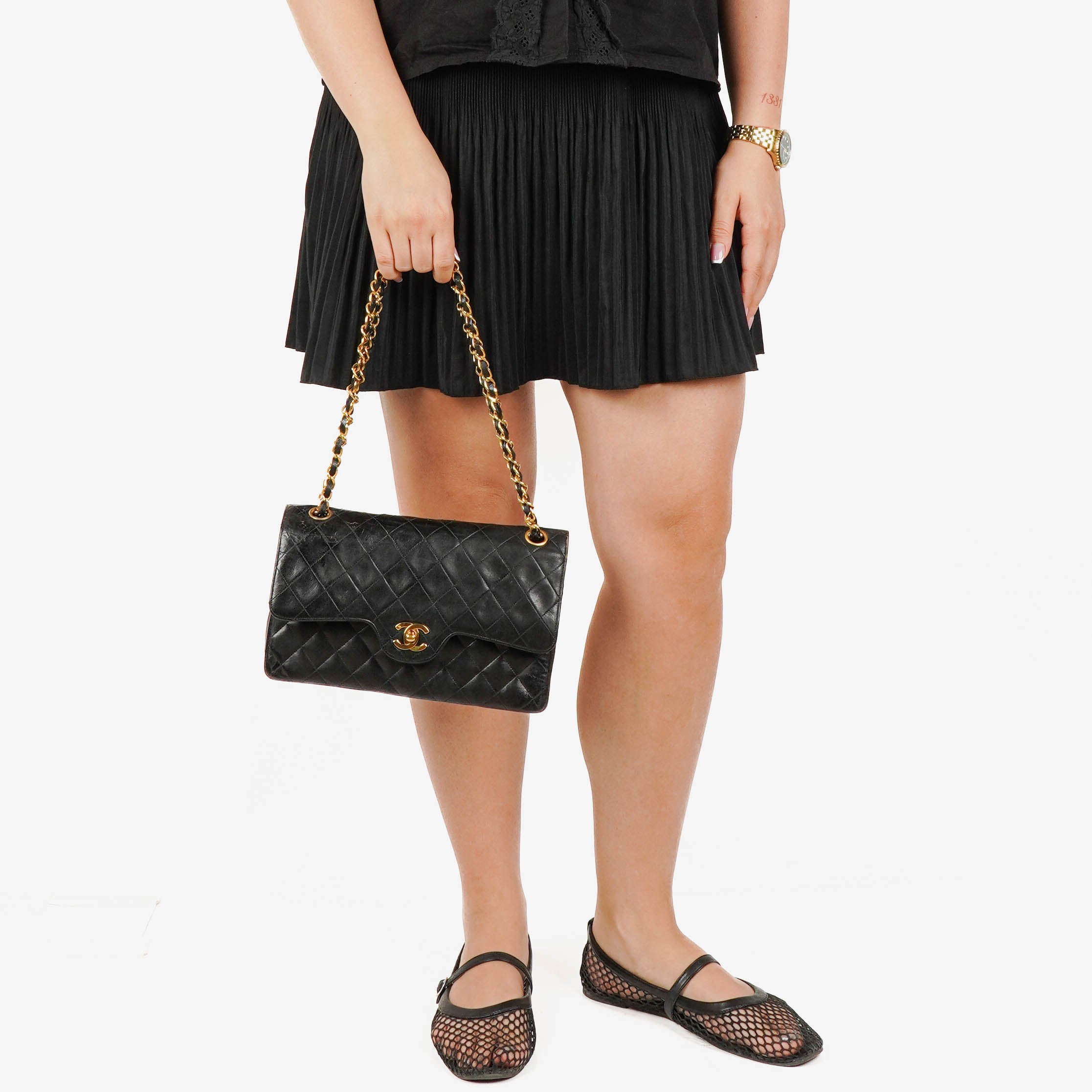 Chanel Vintage Classic Double Flap Bag in Quilted Black Lambskin with 24K Gold-Plated Hardware
