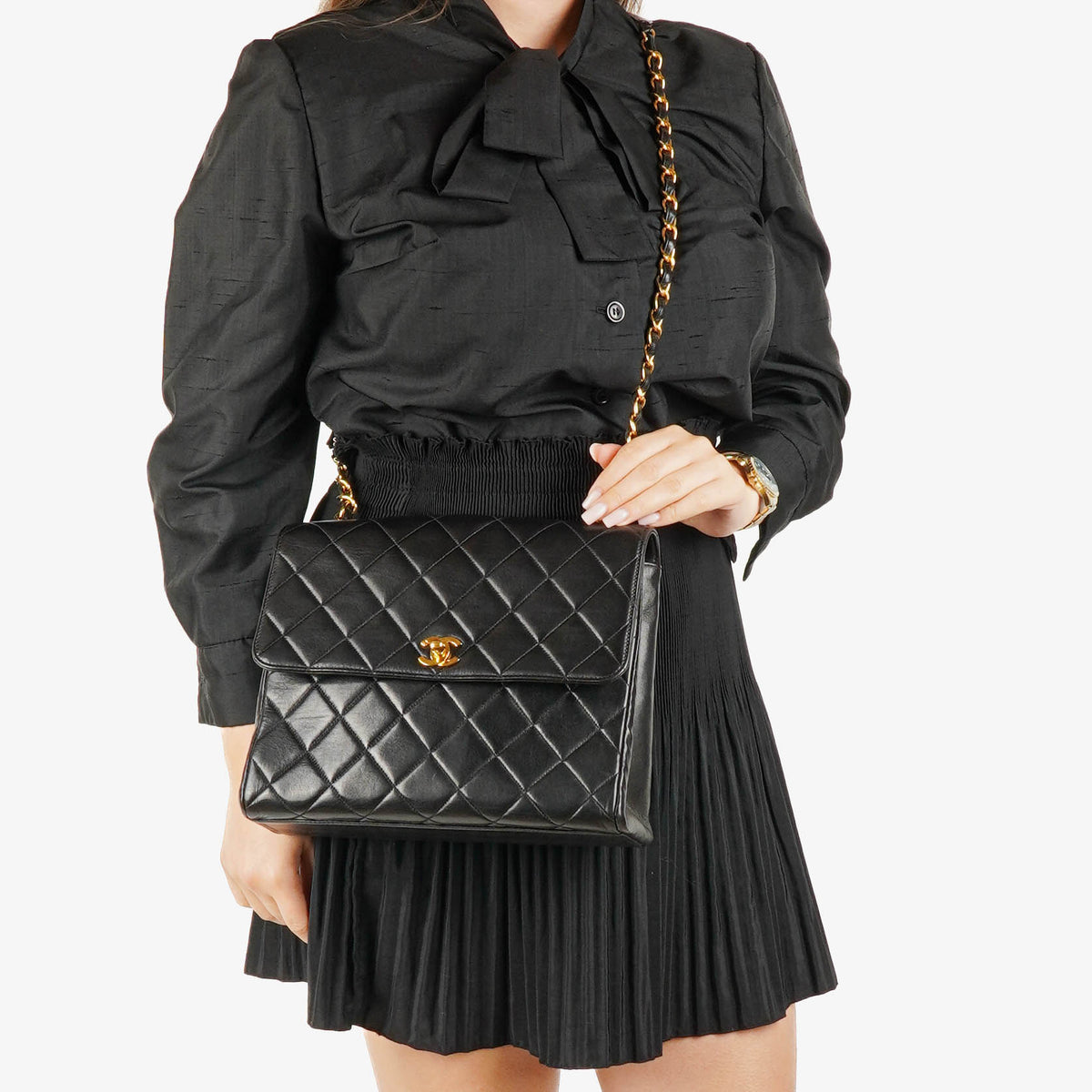 Chanel Single Flap Bag Black Quilted Lambskin With 24K Gold-Plated Hardware