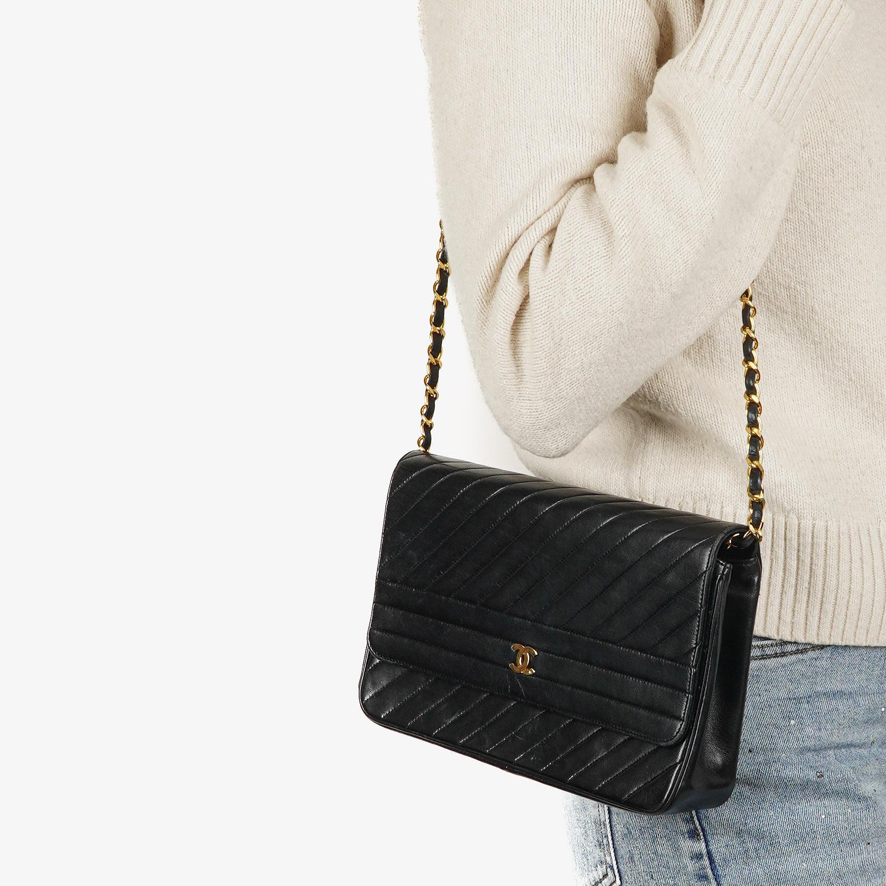 Chanel Black Diagonal Quilted Lambskin Leather Medium Classic Single Flap Bag With 24K Gold-Plated Hardware