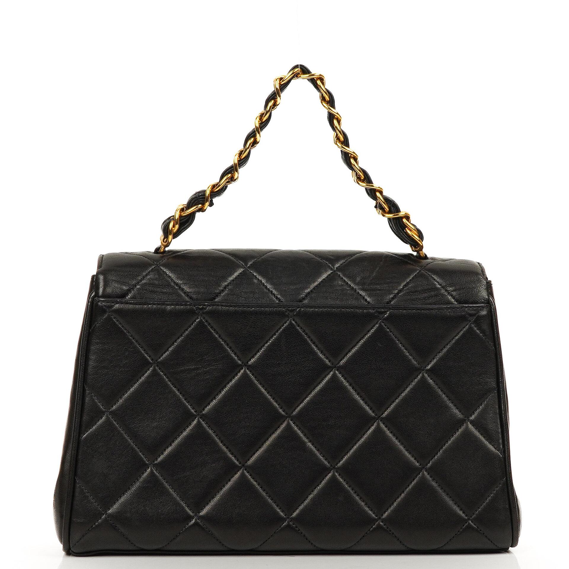 Chanel Flap Bag In Black Quilted Lambskin With Chain Top Handle And 24K Gold-Plated Hardware, 1994-1996