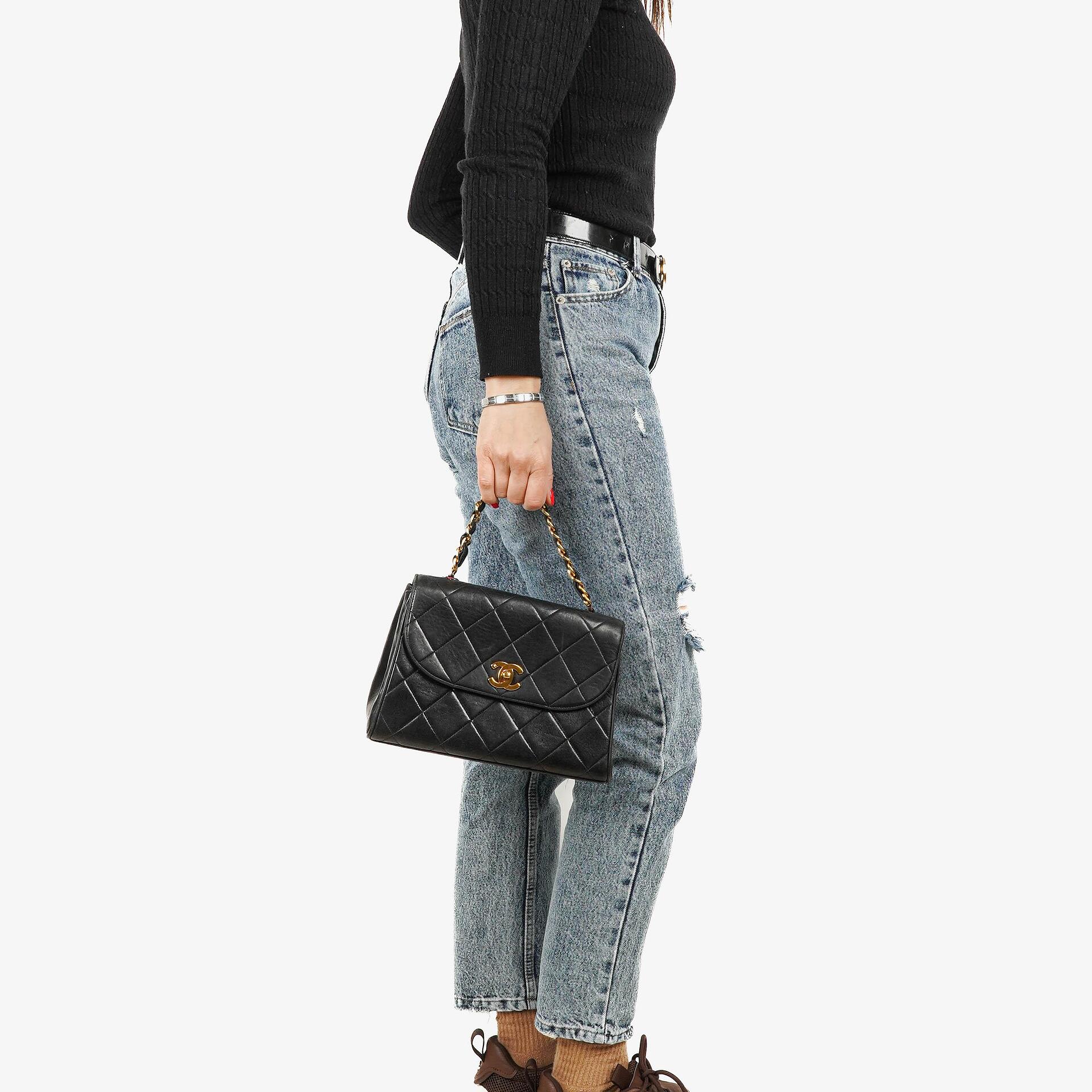 Chanel Flap Bag In Black Quilted Lambskin With Chain Top Handle And 24K Gold-Plated Hardware
