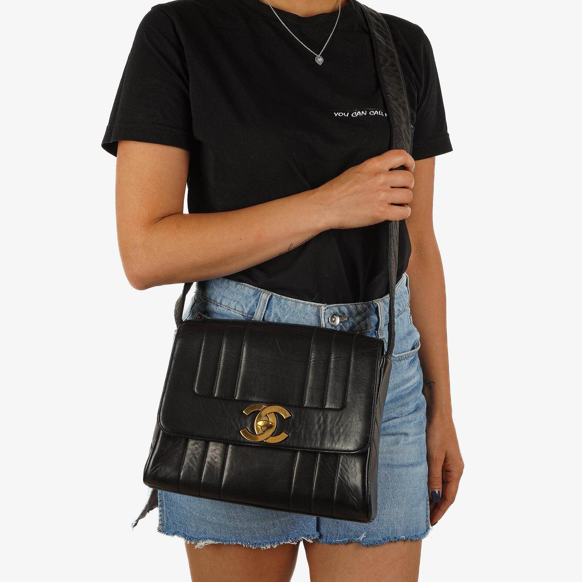 Chanel Maxi Logo Crossbody Flap Bag Black Vertical Quilted Lambskin 24K Gold-Plated Hardware