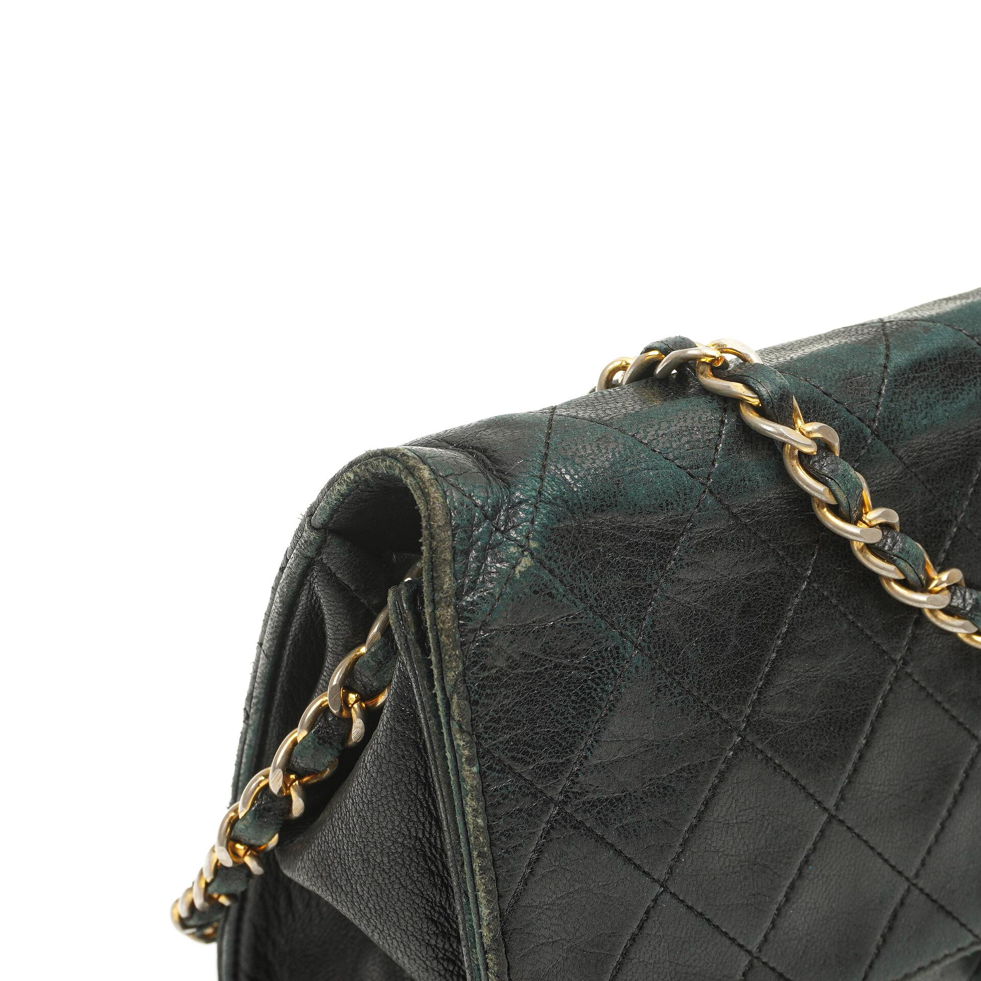 Chanel Medium Classic Single Flap Bag Black Quilted Lambskin 24K Gold-Plated Hardware