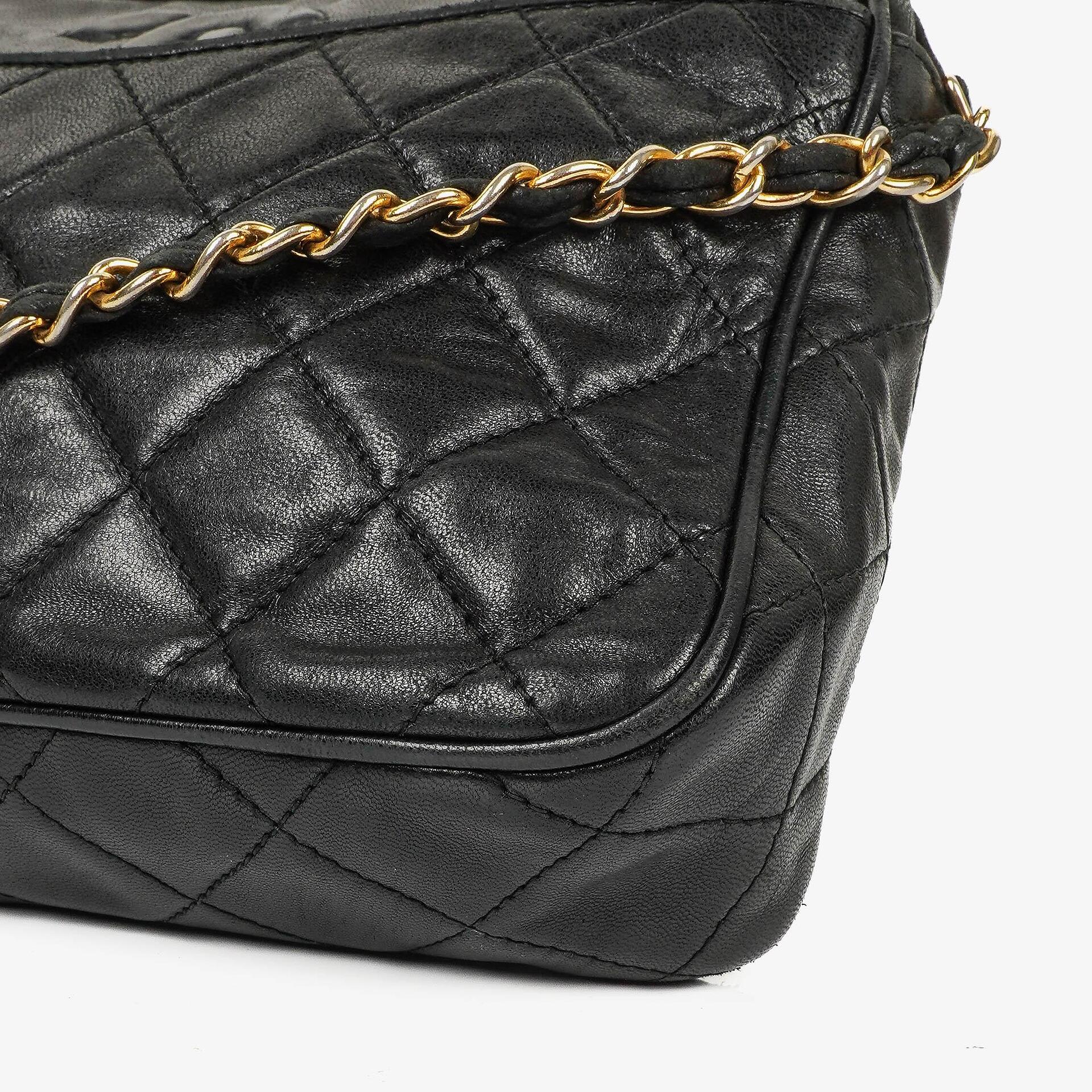 Chanel Vintage Camera Tassel Bag CC Front Pocket Black Quilted Lambskin