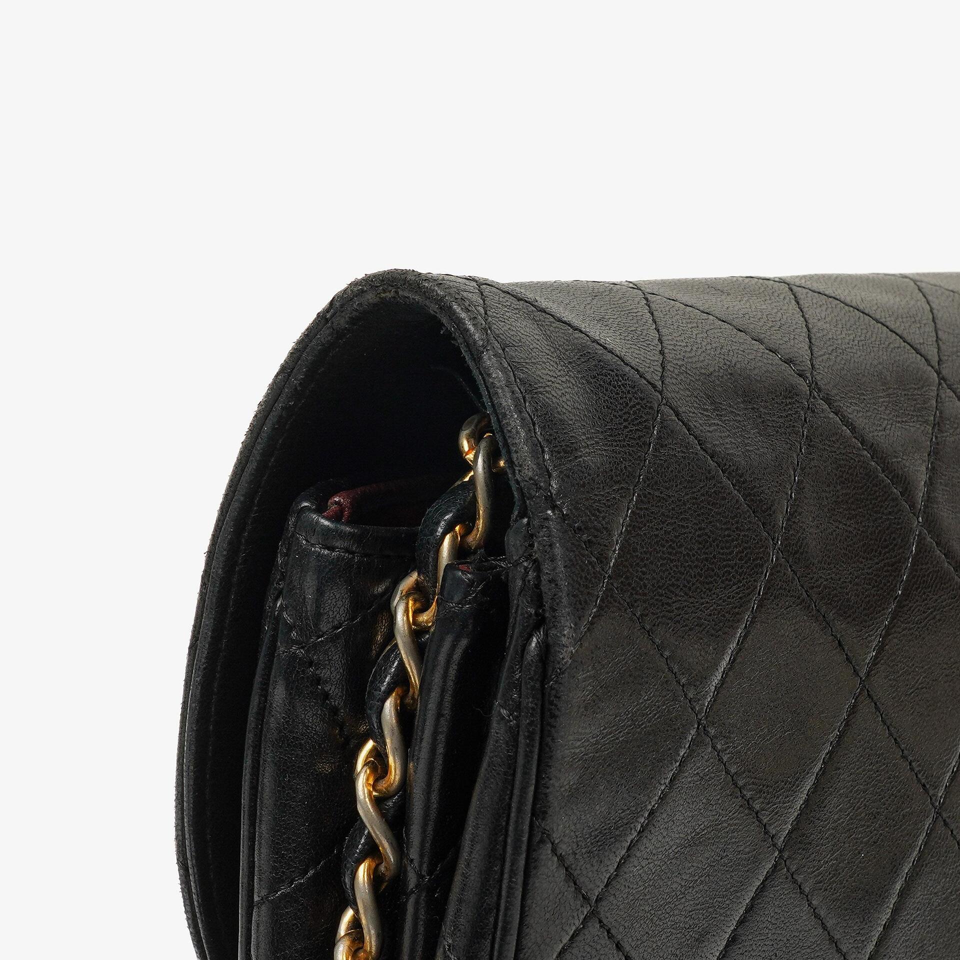 Chanel Vintage Large Half-Moon Single Flap Bag Black Quilted Lambskin 24K Gold-Plated Hardware, 1986-1988