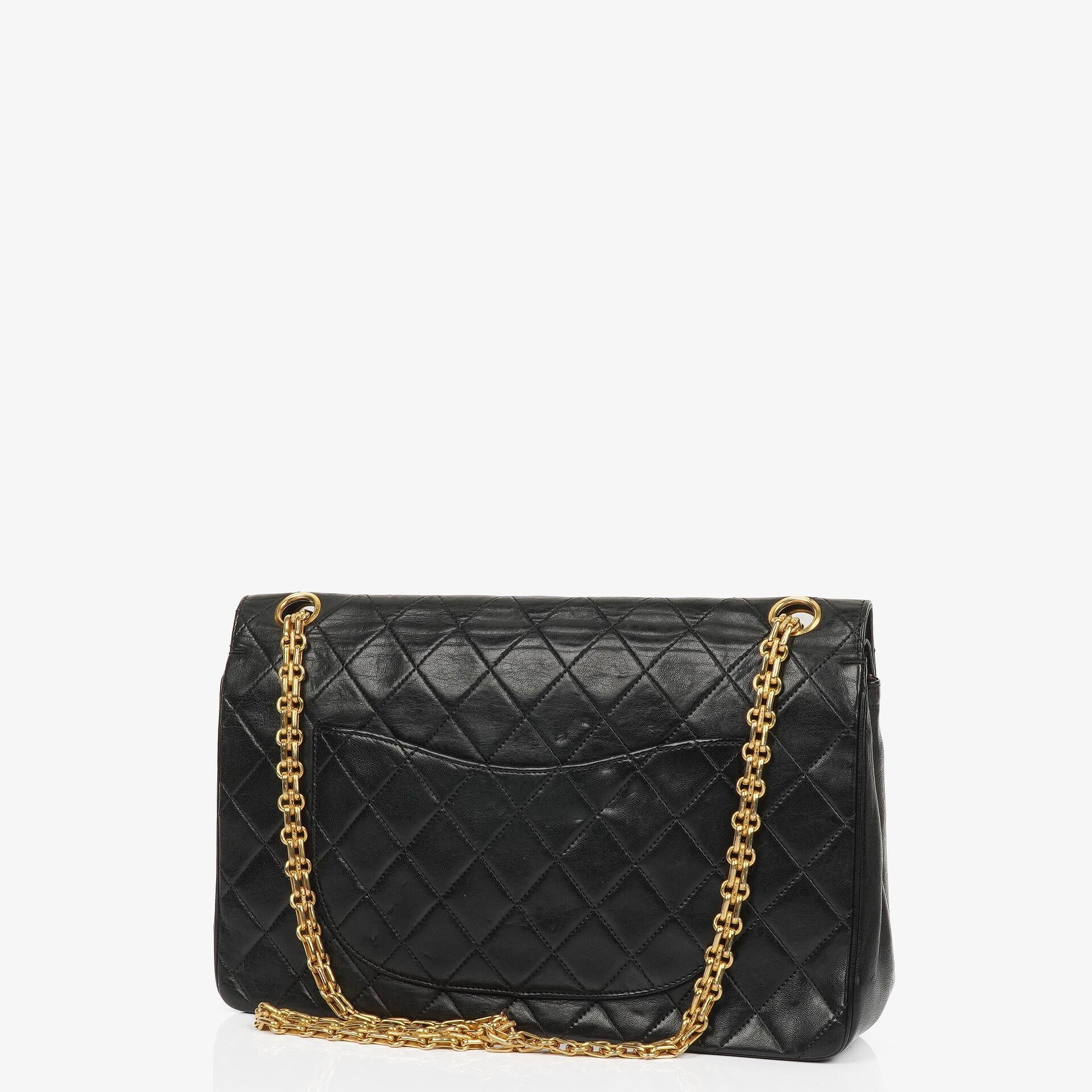 Chanel Vintage Medium Timeless Classic Double Flap Bag In Black Quilted Lambskin With 24K Gold-Plated Hardware And Mademoiselle Chain
