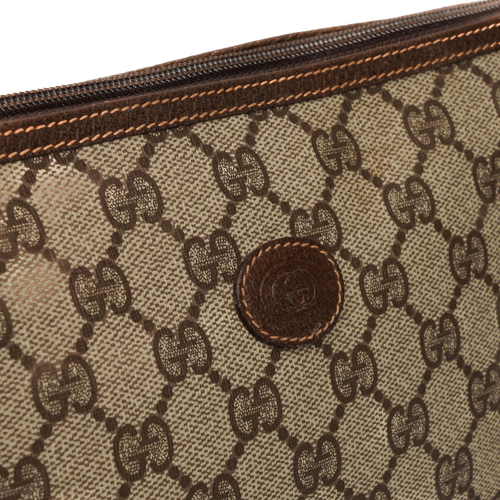 Gucci GG Supreme Monogram Clutch Bag
