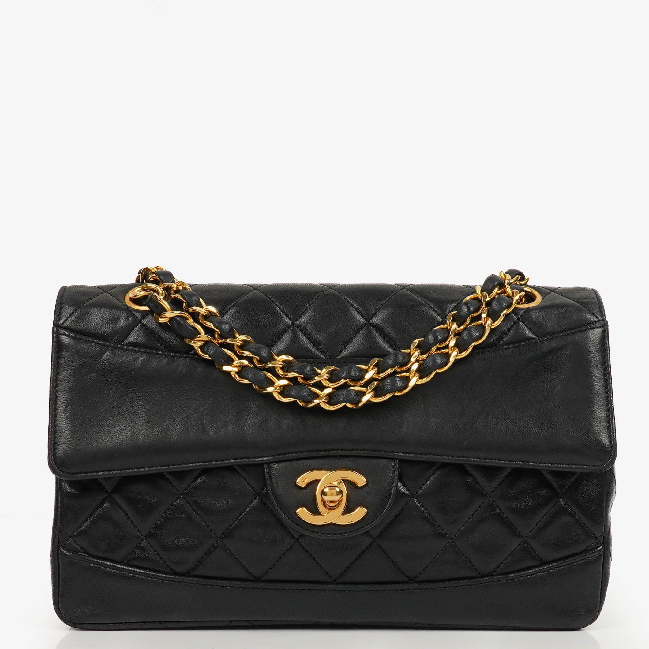 Vintage Chanel Classic Single Flap bag in black quilted lambskin with 24k gold-plated hardware