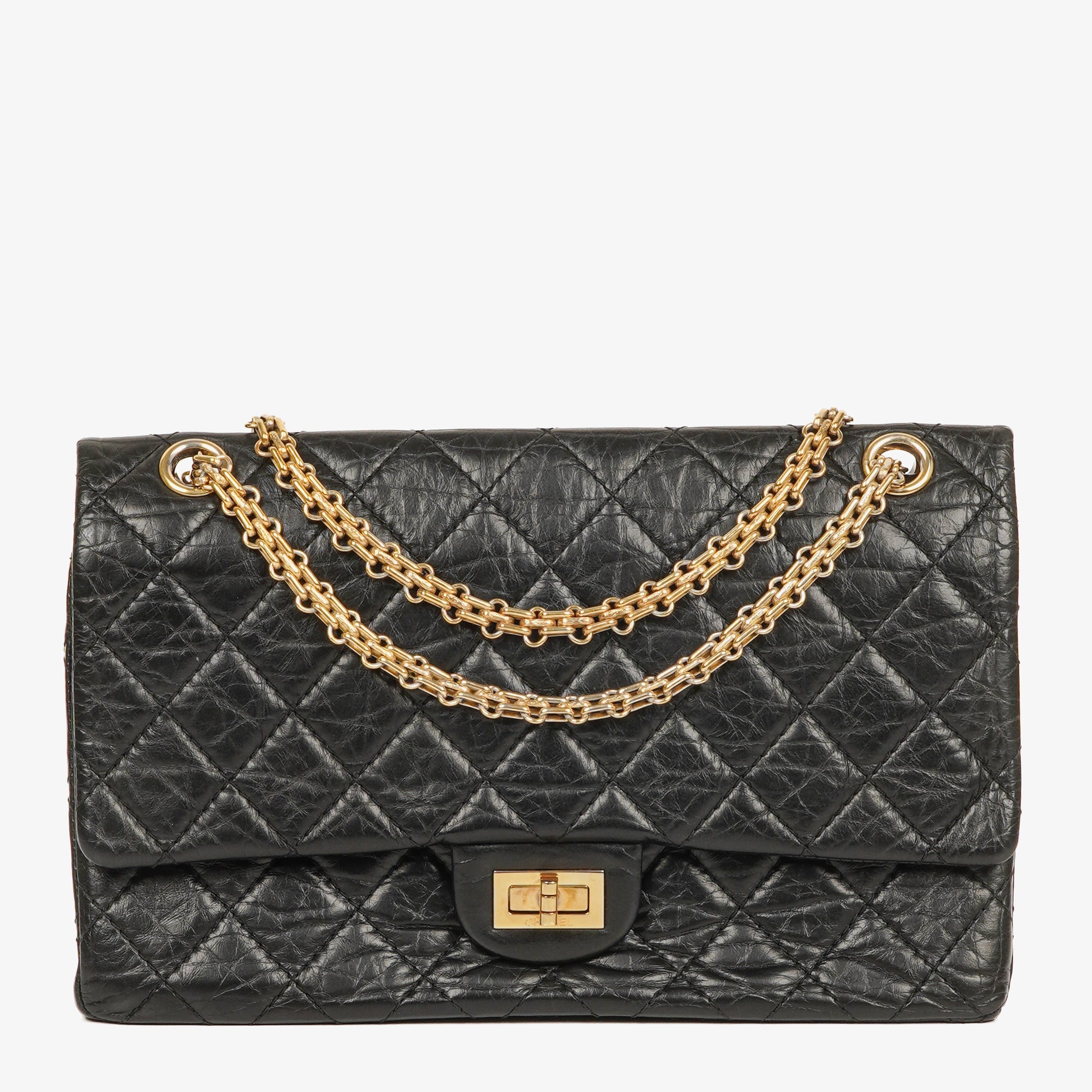 Pre-owned Chanel 2.55 Reissue double flap bag in black aged calfskin
