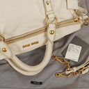 Sac satchel Miu Miu Vitello Lux avec nœud Talco