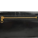 Pochette bracelet Chanel CC en cuir verni noir avec ferrures dorées 24K