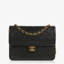 Chanel Liten Classic Enkel Flikväska Svart Quiltad Lammnappa med 24K Guldpläterad Metall