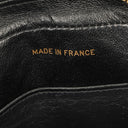 Sac appareil photo vintage Chanel en cuir matelassé noir avec ferrures plaquées or 24 carats