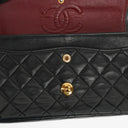 Chanel Double Flap Bag in Quilted Black Lambskin With 24K Gold-Plated Hardware