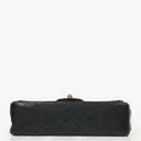 Chanel Double Flap Bag in Quilted Black Lambskin With 24K Gold-Plated Hardware