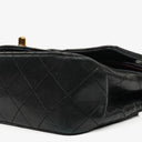 Chanel Double Flap Bag in Quilted Black Lambskin With 24K Gold-Plated Hardware