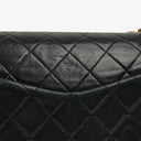 Chanel Double Flap Bag in Quilted Black Lambskin With 24K Gold-Plated Hardware
