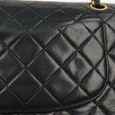 Chanel Double Flap Bag in Quilted Black Lambskin With 24K Gold-Plated Hardware
