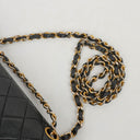 Chanel Double Flap Bag in Quilted Black Lambskin With 24K Gold-Plated Hardware