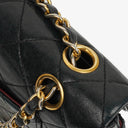 Chanel Double Flap Bag in Quilted Black Lambskin With 24K Gold-Plated Hardware