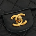 Chanel Double Flap Bag in Quilted Black Lambskin With 24K Gold-Plated Hardware