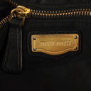 Sac Hobo Miu Miu Coffer Matelassé en cuir noir