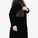 Chanel Double Flap Bag in Quilted Black Lambskin With 24K Gold-Plated Hardware