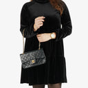 Chanel Double Flap Bag in Quilted Black Lambskin With 24K Gold-Plated Hardware