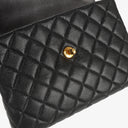 Chanel Kelly Top Handle Caviar Black Quilted Leather Bag