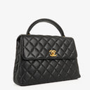 Chanel Kelly Top Handle Caviar Black Quilted Leather Bag