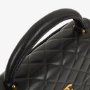 Chanel Kelly Top Handle Caviar Black Quilted Leather Bag