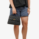 Chanel Kelly Top Handle Caviar Black Quilted Leather Bag