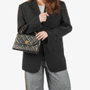 Chanel Flap Bag In Black Quilted Lambskin With Chain Top Handle And 24K Gold-Plated Hardware, 1994-1996