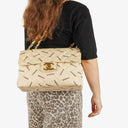 Chanel Jumbo Letter Logo Bag Beige Canvas With 24K Gold-Plated Hardware