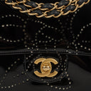 Chanel Camellia Perforated Black Patent Leather Flap Bag