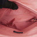 Sac à rabat Mademoiselle Chanel en daim rose chocolat