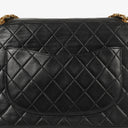 Chanel Vintage Classic Medium Double Flap Bag in Quilted Black Lambskin with 24-karat Gold-Plated Hardware