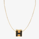 Hermès Gold Plated and Black Enamel Cage D'H Pendant Necklace