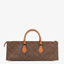 Louis Vuitton Sac Triangle Monogram Handbag