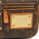 Louis Vuitton Monogram Coated Canvas Riveting Limited Edition Pochette Accessories Clutch Bag