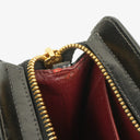 Pochette bracelet Chanel en cuir verni noir avec logo CC