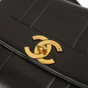 Chanel Maxi Logo Crossbody Flap Bag Black Vertical Quilted Lambskin 24K Gold-Plated Hardware